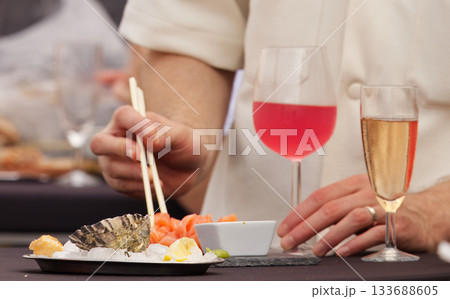 Oysters on ice with wine and sashimi Oysters on ice with wine and sashimi 133688605