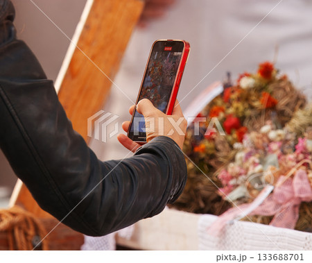 Taking photo of flower stall at Naplavka farmers market Prague 133688701