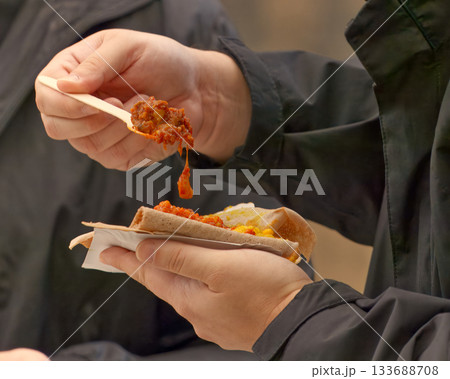Street food with meat and bread at Karlin food festival Prague Street food with meat and bread at Karlin food festival Prague 133688708