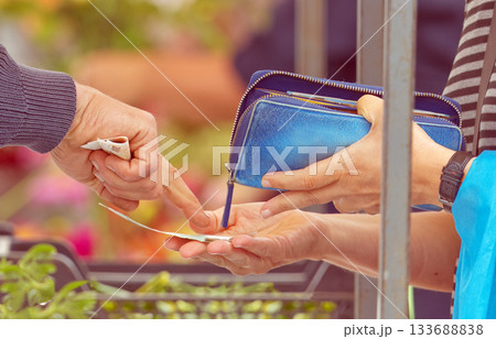 Tourist learning Czech currency at Naplavka market 133688838