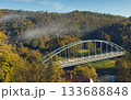Morning mist over forest and bridge near Skryje 133688848