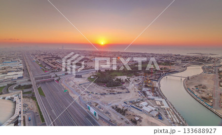 Panorama and aerial view of coastline Dubai at sunset timelapse, United Arab Emirates Panorama and aerial view of coastline Dubai at sunset timelapse, United Arab Emirates 133688927