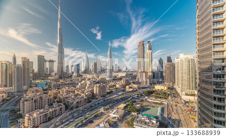 Dubai Downtown skyline timelapse with Burj Khalifa and other towers panoramic view from the top in Dubai Dubai Downtown skyline timelapse with Burj Khalifa and other towers panoramic view from the top in Dubai 133688939