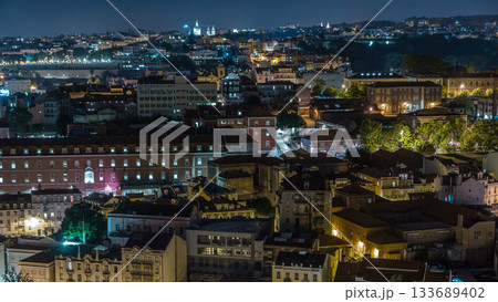 Lisbon aerial view of city centre with illuminated building at night timelapse, Portugal Lisbon aerial view of city centre with illuminated building at night timelapse, Portugal 133689402