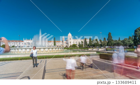 Jeronimos monastery and fountain seen from the Imperio garden timelapse hyperlapse in Lisbon, Portugal. Jeronimos monastery and fountain seen from the Imperio garden timelapse hyperlapse in Lisbon, Portugal. 133689411