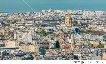 Aerial panorama above many houses rooftops in a Paris timelapse Aerial panorama above many houses rooftops in a Paris timelapse 133689437