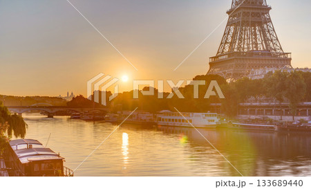 Eiffel Tower and the Seine river at Sunrise timelapse, Paris, France Eiffel Tower and the Seine river at Sunrise timelapse, Paris, France 133689440