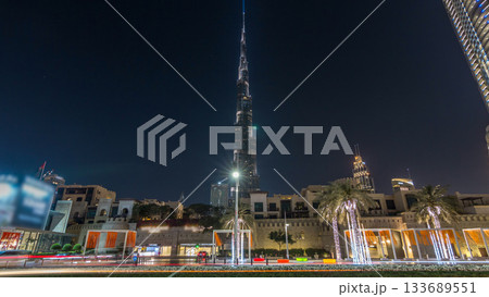 View on modern skyscrapers and busy evening road timelapse hyperlapse in luxury Dubai city, Dubai downtown, United Arab Emirates 133689551
