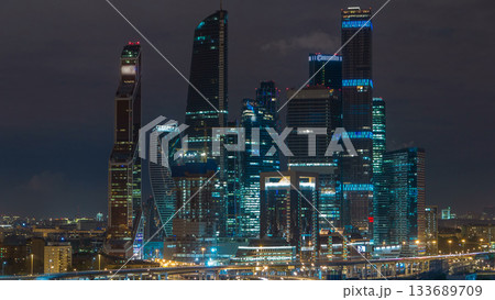 Moscow international business center Moscow City timelapse at night. Urban landscape metropolis night with skyscrapers Moscow international business center Moscow City timelapse at night. Urban landscape metropolis night with skyscrapers 133689709