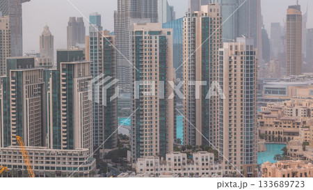 Downtown Dubai skyline with residential towers timelapse, view from rooftop. 133689723
