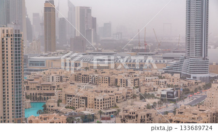 Downtown Dubai skyline with residential towers timelapse, view from rooftop. 133689724