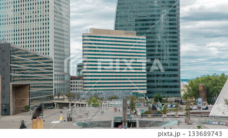 Skyscrapers of Defense timelapse modern business and financial district in Paris with highrise buildings Skyscrapers of Defense timelapse modern business and financial district in Paris with highrise buildings 133689743