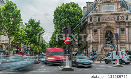Street view of Place Saint-Michel with ancient fountain timelapse, Paris 133689753
