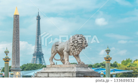 One of the two marble lions of the Tuileries garden overhanging the Concorde place in Paris timelapse 133689832
