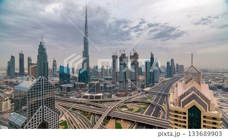 Dubai skyline timelapse at sunset with city center skyscrapers and Sheikh Zayed road traffic, Dubai, United Arab Emirates 133689903