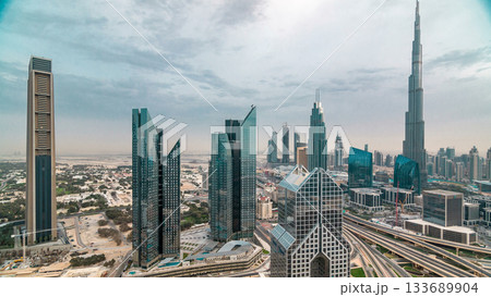 Dubai skyline timelapse at sunset with city center skyscrapers and Sheikh Zayed road traffic, Dubai, United Arab Emirates 133689904