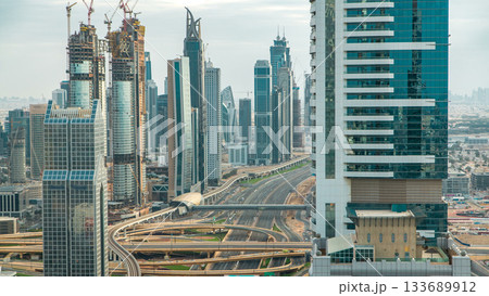 Dubai Downtown timelapse top view before sunset as shot from a rooftop viewpoint. Dubai, UAE 133689912