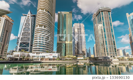 Residential buildings in Jumeirah Lake Towers timelapse in Dubai, UAE. Residential buildings in Jumeirah Lake Towers timelapse in Dubai, UAE. 133690130