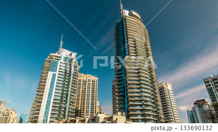 Dubai Marina towers in Dubai at day time timelapse Dubai Marina towers in Dubai at day time timelapse 133690132