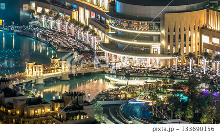 A general view of the bridge over man-made lake timelapse in Dubai downtown, United Arab Emirates. 133690156