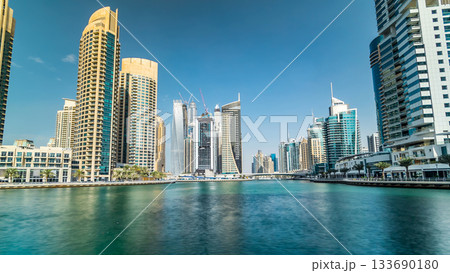 Dubai Marina towers and canal in Dubai timelapse hyperlapse 133690180