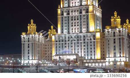 Hotel Ukraine winter night timelapse hyperlapse with bridge over Moscow River. 133690256