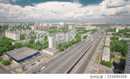 Traffic on the elevated avenue road aerial timelapse overpass on highway in a big city 133690309