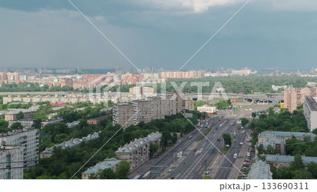 Traffic on the elevated avenue road aerial timelapse overpass on highway in a big city 133690311