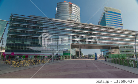Donaustadt Danube City timelapse hyperlapse is a modern quarter with skyscrapers and business centres in Vienna, Austria. Donaustadt Danube City timelapse hyperlapse is a modern quarter with skyscrapers and business centres in Vienna, Austria. 133690437