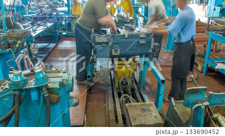 Tractor engine assembled on the factory production line on tractor factory timelapse Tractor engine assembled on the factory production line on tractor factory timelapse 133690452