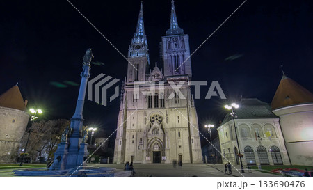 Entrance to Zagreb Cathedral night timelapse hyperlapse and Monument called Maria's pillar. ZAGREB, CROATIA 133690476