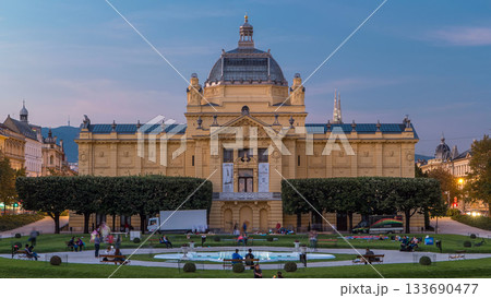 Day to night timelapse view of Art pavilion at King Tomislav square in Zagreb, Croatia. Day to night timelapse view of Art pavilion at King Tomislav square in Zagreb, Croatia. 133690477