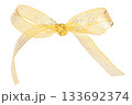 golden ribbon bow isolated on white background 133692374
