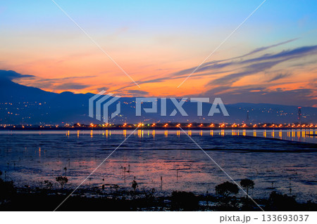 Sunrise Over Wugu Wetland: Taipei's Golden Hour Coastal Landscape. Sunrise Over Wugu Wetland: Taipei's Golden Hour Coastal Landscape. 133693037