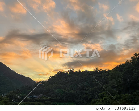 Dramatic Golden Dawn Sky with Clouds Over Mountains in Wulai, Taiwan. 133693115