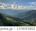 Layers of green mountains, sun rays, cloudscape, landscape meadows. 133693802
