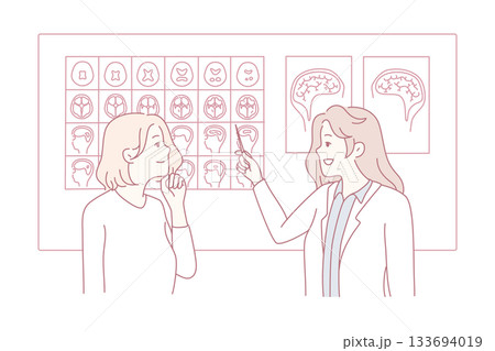 two female brain specialists engaged in detailed examination of magnetic resonance imaging results 133694019