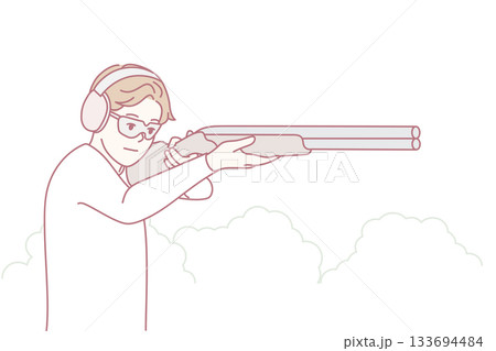 Gunner focusing outdoors, Outdoor shooter maintaining steady aim during recreational practice 133694484