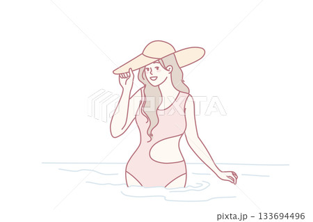 Smiling woman in swimsuit in sea Smiling woman in swimsuit in sea 133694496