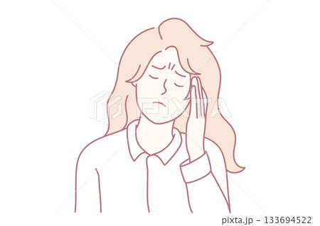woman with headache, seeking relief from severe pain, indoor scene showing headache and discomfort 133694522