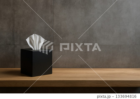 黒いスクエアティッシュケースと木製カウンターのコンクリート背景 133694816