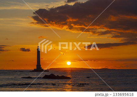 Gatteville lighthouse standing against a dramatic sunset sky 133695618