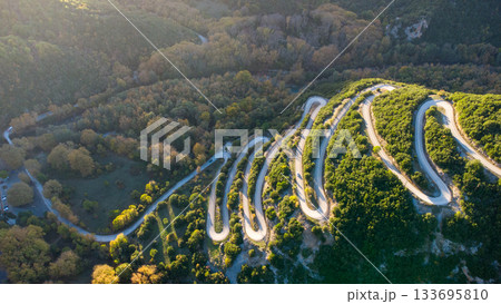 Winding Road. Golden Hour. Sunset. Pindus National Park. Greece. Vikos Winding Road. Golden Hour. Sunset. Pindus National Park. Greece. Vikos 133695810