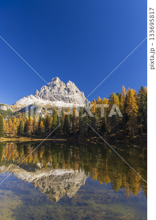 Tre Cime di Lavaredo mountain reflected in autumn lake Tre Cime di Lavaredo mountain reflected in autumn lake 133695817