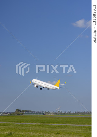 White airplane taking off from runway in Vijfhuizen White airplane taking off from runway in Vijfhuizen 133695913