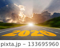 Go to the New Year 2022 concept. Bright road leading to the year 2026 with sunlight breaking through the clouds, symbolizing hope, progress, and a new beginning. 133695960