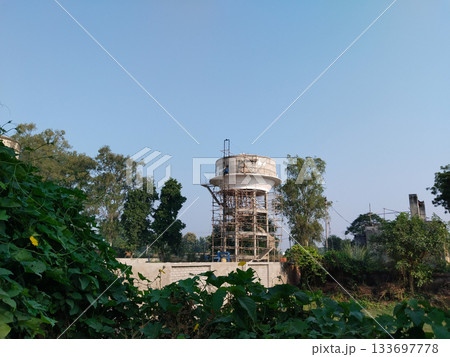 construction work site of water tank in village. newly creating water supply tank 133697778