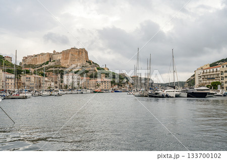 Aerial view marina cape Bonifacio south Corsica France citadel on rocky promontory on wild white limestone cliffs Aerial view marina cape Bonifacio south Corsica France citadel on rocky promontory on wild white limestone cliffs 133700102