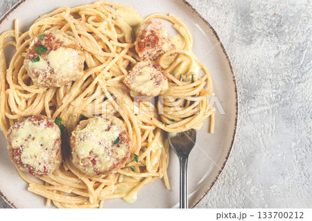 spaghetti with chicken meatballs, with cream sauce, and parmesan cheese, and decorated with microgreens, homemade, no people, 133700212