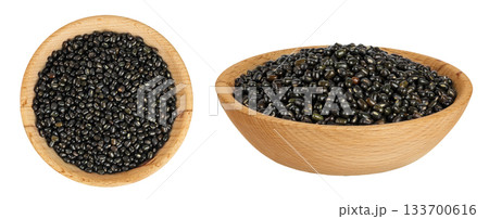 Black bean or Urad dal, black gram, vigna mungo in wooden bowl isolated on the white background. Top view. Flat lay. Black bean or Urad dal, black gram, vigna mungo in wooden bowl isolated on the white background. Top view. Flat lay. 133700616